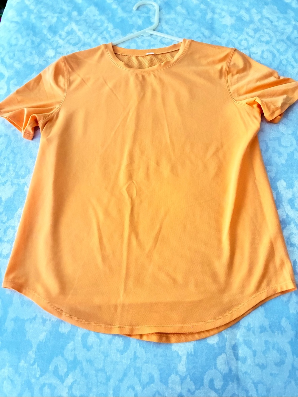 Lululemon tangerine orange top size 4
